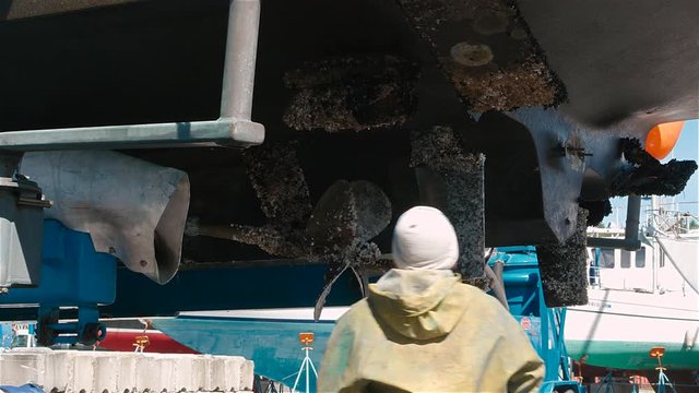 Boat hull Barnacle Scraping