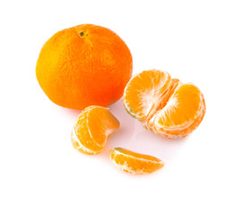 Ripe mandarines close-up on a white background