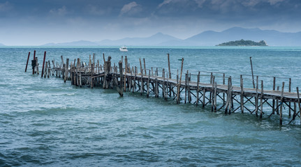 Nice wooden bridge with blue sea background at Samui island, Tha