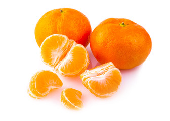 Ripe mandarines close-up on a white background