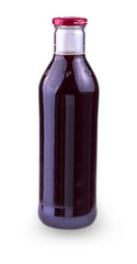 glass bottle with a lid with pomegranate juice