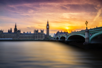 Westminster's sunset with Big Ben, Parliament and river Thames. 