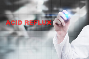 Medical doctor drawing acid reflux on virtual screen.