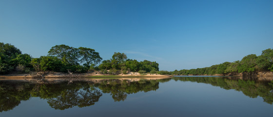 Serene lagoon with reflection