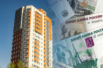 Residential high-rise house on the background of banknotes . Тhe concept of sales in the real...