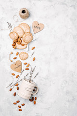 Border with cookies, mug, almonds, lavender and decoration.  Background with Free Space for your  Text, Top View. © igishevamaria