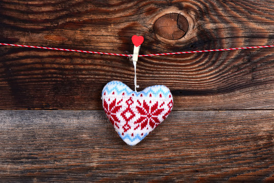 Heart on a beautiful old wooden background as love concept for valentines day
