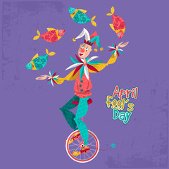Clown on unicycle juggling fish. April Fool’s Day. © ngvozdeva