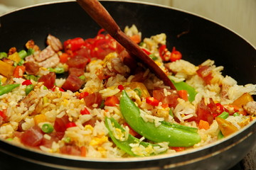 Cooking , Chinese sausage fried rice with mixed vegetable.