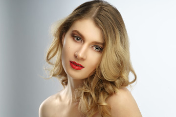 Fototapeta premium Blonde woman natural hair beauty closeup portrait