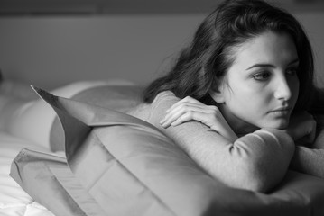 Woman lying on the bed