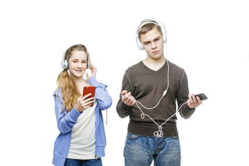Teen boy and girl with headphones