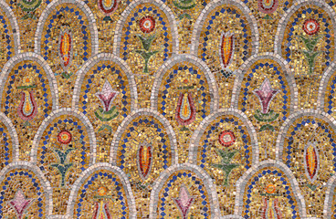 The wall in the temple of colorful mosaic