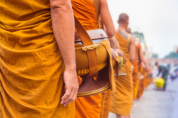Thai Buddhist Monks line up in The Morning with Bowl for Buddhis © siriporn1982