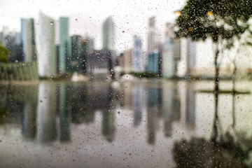 abstract defocused background of city in rain