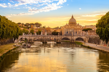Plakat Daily view of San Pietro, Saint Peter basilica, with Sant'Angelo bridge and Tevere river in Rome, Italy