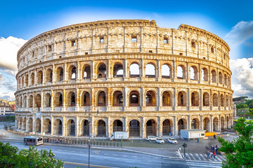 Fototapeta na wymiar Aerial view of Colosseo, Colosseum, Flavian Amphitheatre, the largest amphitheater in the world and one of the symbols of Italy. Symbol of Rome, located in historical center, Unesco Heritage Site.