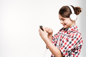 Side view of Girl in shirt listening music