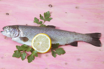 trout on a background of rose wood
