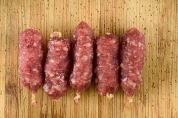 sausages on wooden table