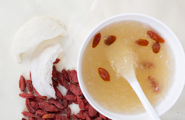Top view of Asian style edible bird's nest wolfberry porridge