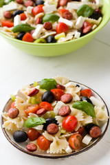 farfalle salad on white table