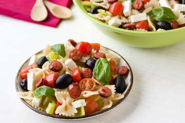 farfalle salad on white table