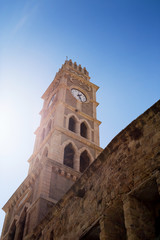 Fototapeta na wymiar Khan al-Umdan Clock Tower in Old City, Acre, Israel