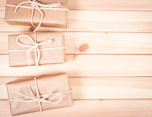 Rustic parcels gift box with kraft paper.
