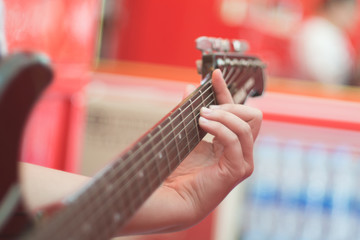 Fototapeta premium Handle electric guitar playing chord 