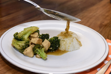 Cooking and serving of broccoli with chicken breast