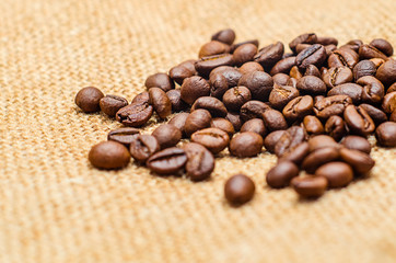 coffee beans on burlap background