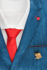 Classic denim suit, shirt, cufflinks and tie, close-up.