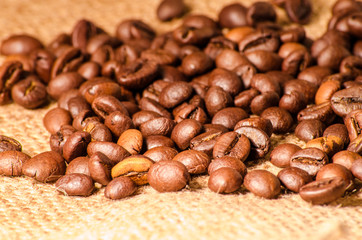 coffee beans on burlap background