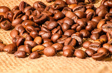 coffee beans on burlap background