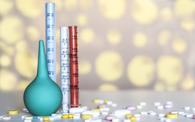 Blue Pink enema on a yellow background