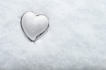 Ceramic heart in the snow