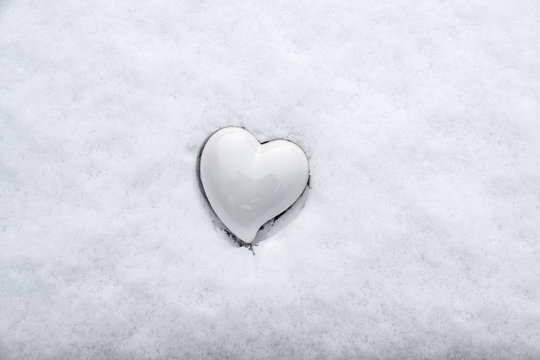 Ceramic heart in the snow