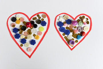 Hearts made of paper and beads.