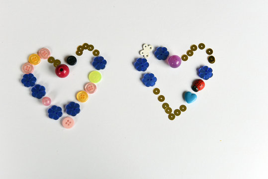 Hearts made of paper and beads.