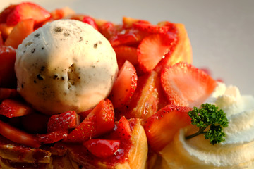 Dessert honey toast with ice cream and strawberry for romantic sweet time in valentine's day 