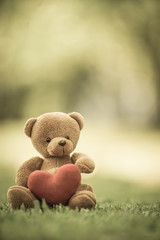 bear doll and red heart with dramatic tone