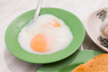 Half-boiled eggs, Traditional Singapore Breakfast called Kaya To