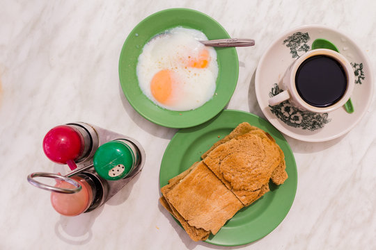 Traditional Singapore Breakfast Called Kaya Toast, Coffe Coconut