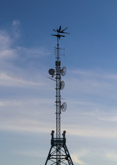 silhouette on transmitting tower