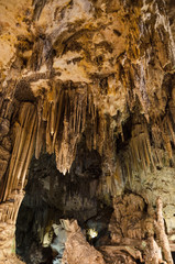 Nerja cave formations. Stalactites and stalagmites in the famous Nerja caves in Malaga, Andalusia, Spain.