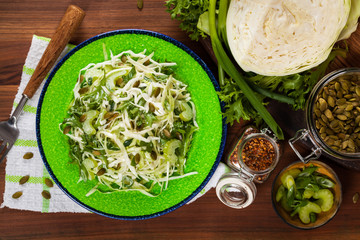 Coleslaw Cabbage Salad with Pumpkin Seeds. Selective focus.