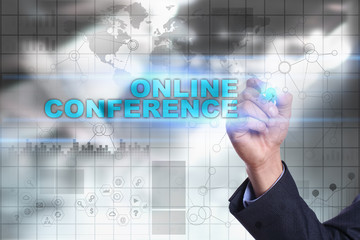Businessman is drawing on virtual screen. online conference concept.