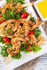Grilled Shrimp Skewers Summer Healthy Salad. Selective focus.