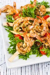 Grilled Shrimp Skewers Summer Healthy Salad. Selective focus.